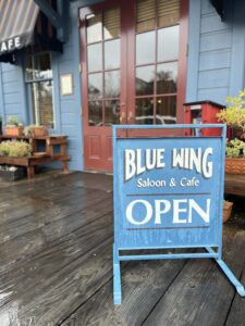 Blue Wing Saloon Open Sign